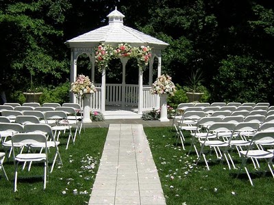 white folding chairs wedding